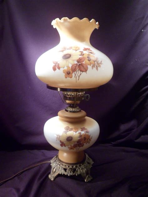 Gone with the wind lamps on ebay - Gone With The Wind Lamp. Oil converted to electric, base does not light, 25” tall with chute, top rim is rough. 